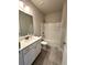 Clean bathroom with a combined bathtub and shower at 310 Ellington Dr, Canton, GA 30115