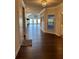 Elegant foyer featuring hardwood floors and views of the living area and bright windows at 310 Ellington Dr, Canton, GA 30115