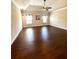 Spacious main bedroom with hardwood floors and natural light at 310 Ellington Dr, Canton, GA 30115