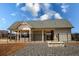 Community building features an open-air structure with a stone fireplace, and is surrounded by a black metal fence at 443 Faulkner St, Stockbridge, GA 30281