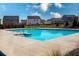 Large community pool for residents to enjoy with clear blue water, surrounding homes in the neighborhood at 443 Faulkner St, Stockbridge, GA 30281