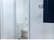 Bright bathroom featuring a white toilet, cabinet, and walls, creating a clean and modern look at 451 Collier Ridge Dr, Atlanta, GA 30318