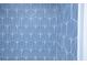 A close up of the eye-catching blue and white shower tile with a geometric pattern at 451 Collier Ridge Dr, Atlanta, GA 30318