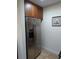 A stainless steel refrigerator is complimented by wood cabinets at 6980 Roswell Rd # E11, Atlanta, GA 30328