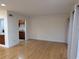 A bright living room with neutral walls and hardwood flooring, showcasing the home's modern and open design at 6980 Roswell Rd # E11, Atlanta, GA 30328
