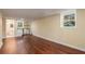 A wide view of the basement living area with a kitchenette and bathroom at 2600 Cohassett Ct, Decatur, GA 30034