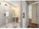 Modern bathroom with glass shower and barn door at 2600 Cohassett Ct, Decatur, GA 30034