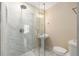 Modern bathroom featuring a glass-enclosed shower and pedestal sink at 2600 Cohassett Ct, Decatur, GA 30034