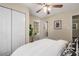 Bright bedroom with a large window, closet, and en-suite bathroom at 2600 Cohassett Ct, Decatur, GA 30034