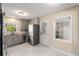 Bright kitchen with stainless steel appliances, tile floors and lots of natural light at 2600 Cohassett Ct, Decatur, GA 30034