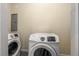 Well-equipped laundry room with modern front-load washer and dryer for convenient laundry care at 2600 Cohassett Ct, Decatur, GA 30034