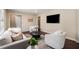 Cozy living room featuring modern decor, comfortable seating, and a warm and inviting atmosphere at 2600 Cohassett Ct, Decatur, GA 30034