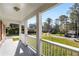 Inviting view from the covered front porch of the charming property and surrounding neighborhood at 2600 Cohassett Ct, Decatur, GA 30034