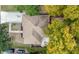 Aerial view of the home highlighting the roof, yard, and driveway at 147 Hermer Nw Cir, Atlanta, GA 30311