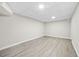 Spacious basement featuring new floors and neutral paint at 147 Hermer Nw Cir, Atlanta, GA 30311