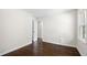 Bright bedroom with hardwood floors, large window and neutral wall color at 147 Hermer Nw Cir, Atlanta, GA 30311