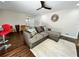 Comfortable living room featuring a gray sectional, hardwood floors, and a neutral color scheme at 147 Hermer Nw Cir, Atlanta, GA 30311