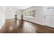 Bright living room with gleaming hardwood floors and plenty of natural light from large windows at 147 Hermer Nw Cir, Atlanta, GA 30311