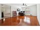 Bedroom featuring hardwood flooring, a ceiling fan, and a doll house at 1595 Johnstown Trace, Suwanee, GA 30024