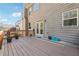 Back deck with space for potted plants and door into the home at 1595 Johnstown Trace, Suwanee, GA 30024