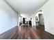 Spacious open floorplan featuring hardwood floors and classic architectural details at 1595 Johnstown Trace, Suwanee, GA 30024