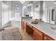 This primary bathroom features double sinks, a soaking tub and neutral paint at 310 Persimmon Dr, Sharpsburg, GA 30277