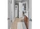 Bathroom leading to a bedroom with a white vanity and tile floors at 310 Persimmon Dr, Sharpsburg, GA 30277