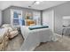 Bedroom with neutral decor, carpet and a bright window at 310 Persimmon Dr, Sharpsburg, GA 30277