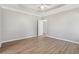 Neutral bedroom with light wood flooring at 3100 Plantation Run Dr, Loganville, GA 30052
