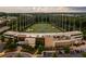 Bird's-eye view of recreation center featuring a golf course, and surrounding wooded landscape at 7220 Summit Pl, Alpharetta, GA 30009
