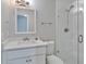 Updated bathroom featuring glass enclosed shower, and white vanity with modern fixtures at 10540 Willow View Cir, Alpharetta, GA 30022