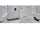 Modern bathroom with glass enclosed shower and sleek black fixtures at 10540 Willow View Cir, Alpharetta, GA 30022