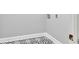 A view of the laundry room hookups and black and white pattern floor at 10540 Willow View Cir, Alpharetta, GA 30022
