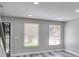 Bright living room featuring recessed lighting and modern gray tones at 10540 Willow View Cir, Alpharetta, GA 30022