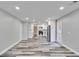 Spacious living area with recessed lighting and easy access to kitchen at 10540 Willow View Cir, Alpharetta, GA 30022