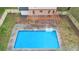 Birds eye view of backyard in-ground pool featuring a pergola and nice deck space at 10540 Willow View Cir, Alpharetta, GA 30022