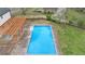 Aerial view of the refreshing in-ground pool, perfect for summer relaxation and entertaining at 10540 Willow View Cir, Alpharetta, GA 30022