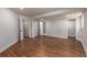 Basement area with multiple entrances and wood look flooring at 2562 Tritt Springs Ne Trce, Marietta, GA 30062
