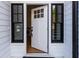 Open front door with sidelight windows and hardwood floors, inviting you into this stunning home at 2562 Tritt Springs Ne Trce, Marietta, GA 30062