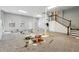 Expansive unfinished basement with large windows, stairs, and potential for customization at 2724 Long Lake Ne Dr, Roswell, GA 30075