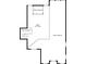 This floor plan shows a large open room and stairwell in the space with 