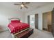 Inviting bedroom featuring a king bed, and ensuite bathroom access, creating a comfortable private space at 4565 Sims Park Overlook, Suwanee, GA 30024