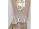 Inviting foyer featuring a modern chandelier and light-colored flooring at 667 Oaktree Park Ct, Lawrenceville, GA 30044