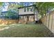 Spacious backyard with a wooden fence surrounding the yard at 99 Brown Ave, Atlanta, GA 30315