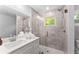 Contemporary bathroom featuring a tiled walk-in shower, sleek vanity, and modern fixtures at 99 Brown Ave, Atlanta, GA 30315