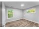 Bright, empty bedroom with two windows at 99 Brown Ave, Atlanta, GA 30315