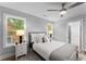 Stylish bedroom with a ceiling fan, neutral decor, and natural light at 99 Brown Ave, Atlanta, GA 30315