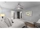 Comfortable bedroom with modern ceiling fan, neutral decor, and natural light at 99 Brown Ave, Atlanta, GA 30315