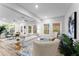 Spacious living room with large windows, comfortable seating, and stylish decor, perfect for relaxation and entertaining at 99 Brown Ave, Atlanta, GA 30315