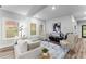Inviting living room with bright windows, modern furniture, and stylish decor elements creating a comfortable living space at 99 Brown Ave, Atlanta, GA 30315